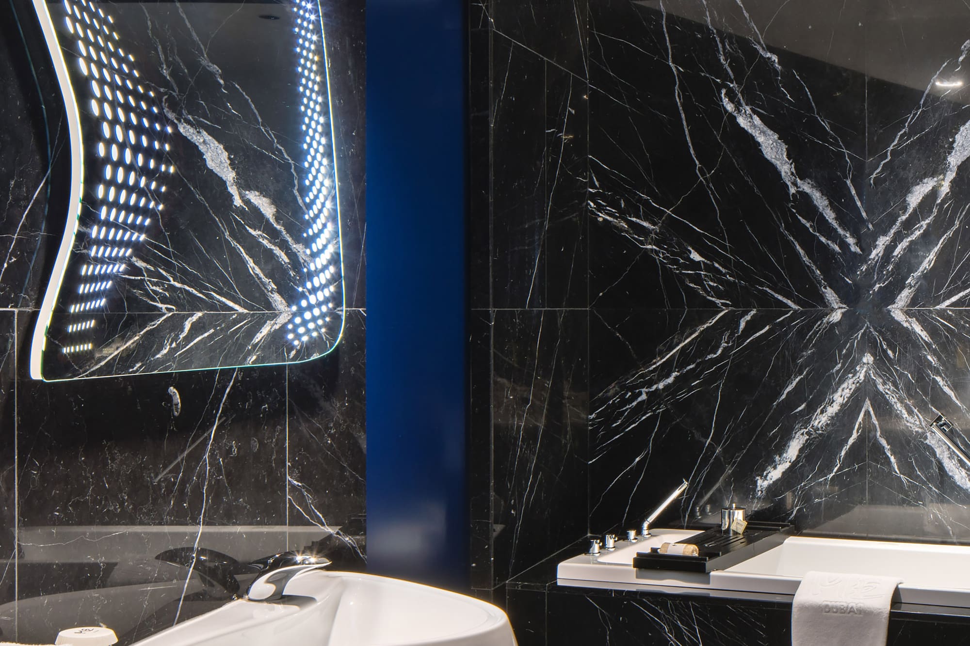 a bathroom with a bathtub and sink