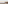 Beach bar with woven shades on sandy coast, calm ocean, pastel sky.