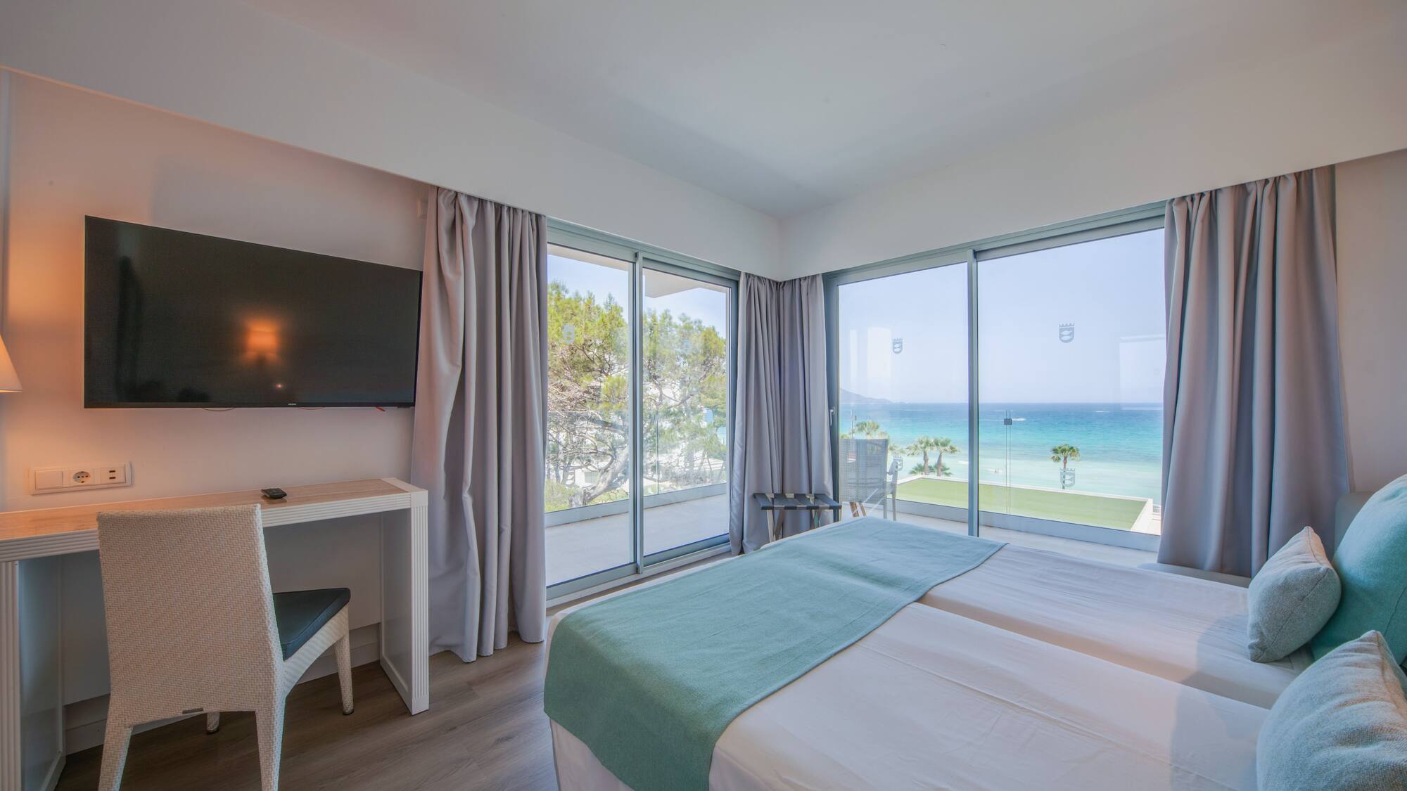 a room with a television and a bed