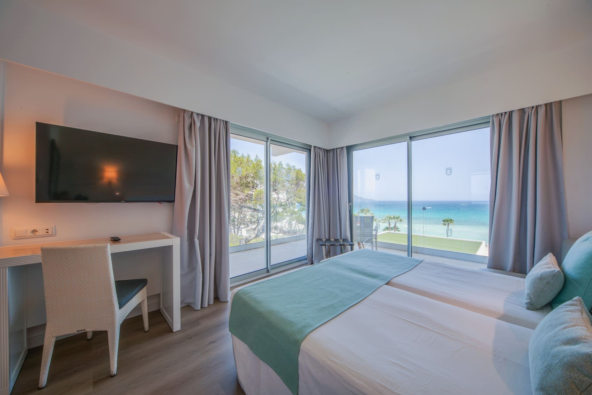 a room with a television and a bed