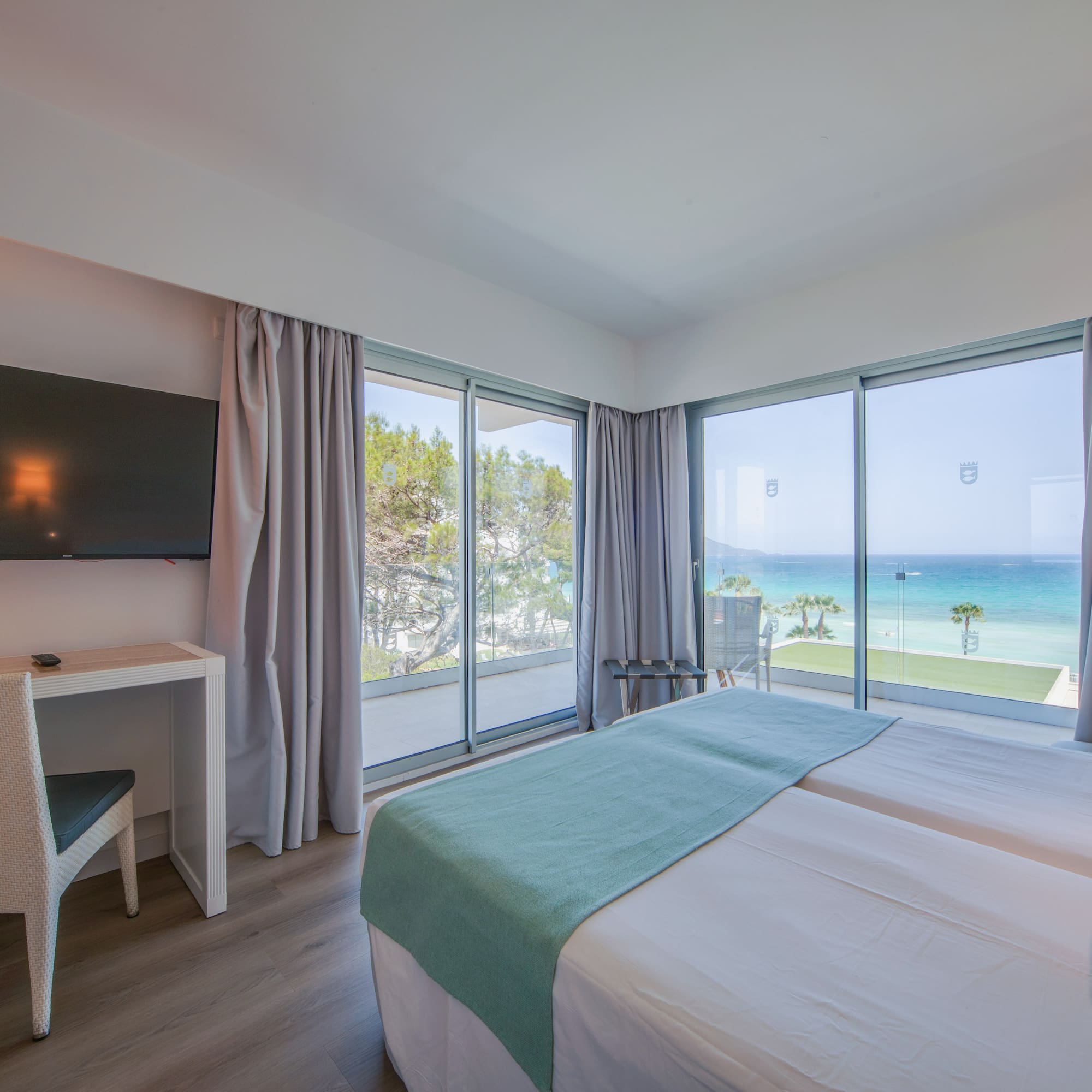 a room with a television and a bed