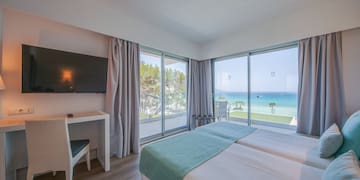 a room with a television and a bed