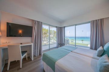 a room with a television and a bed