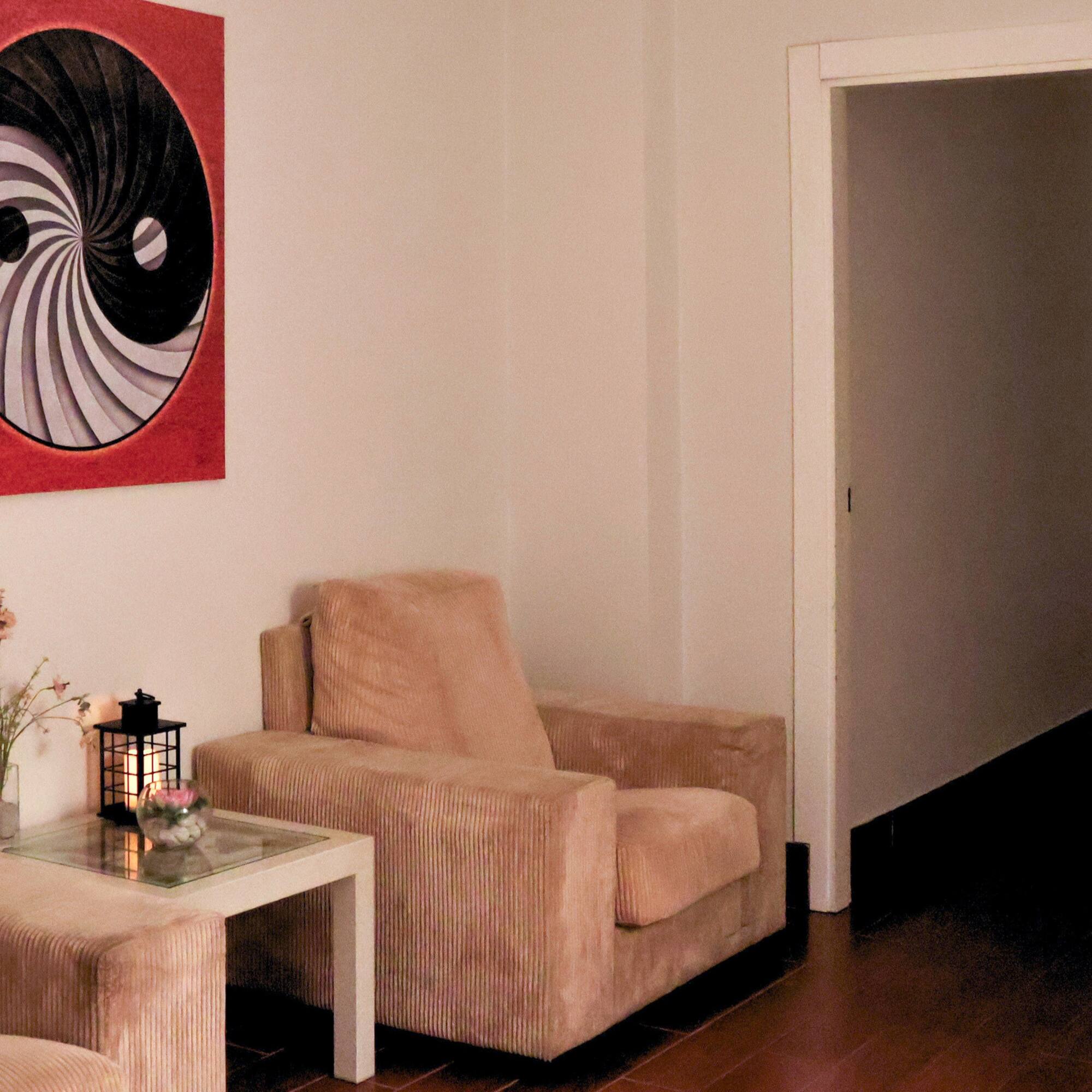 a living room with a couch and a table