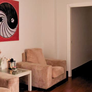 a living room with a couch and a table