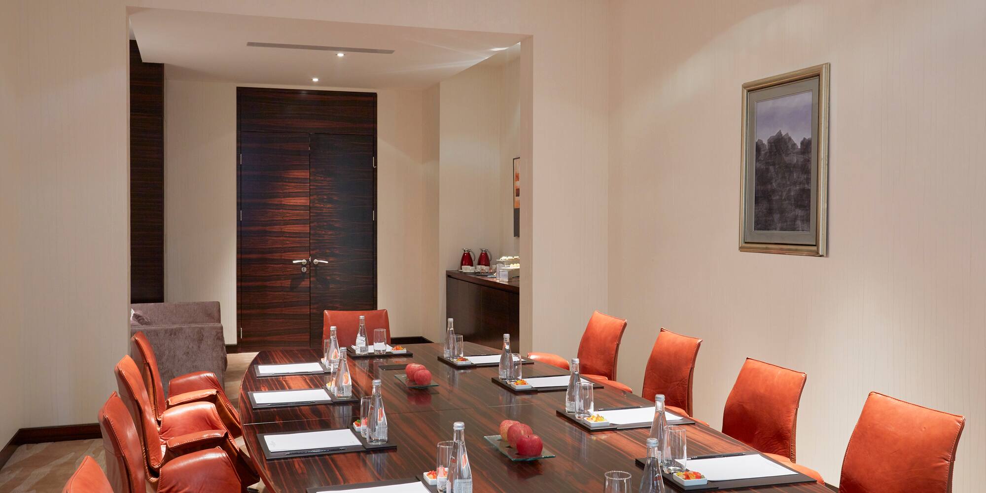 a conference room with chairs and tables