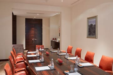 a conference room with chairs and tables