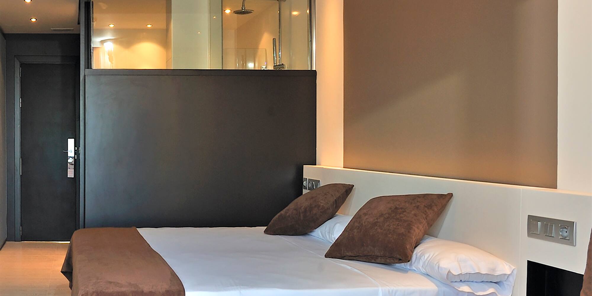 a bed and couch in a room