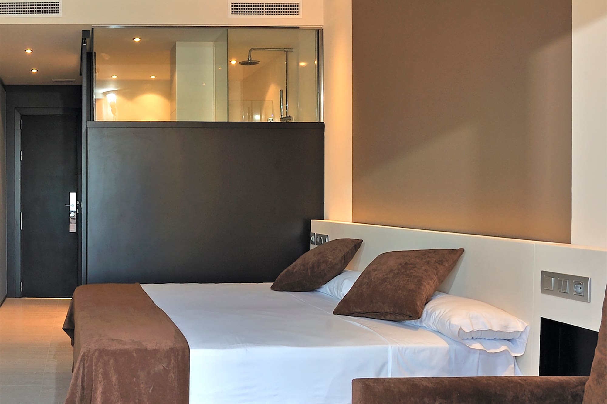 a bed and couch in a room