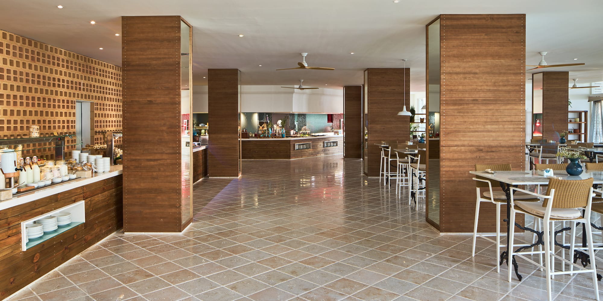 a room with wood walls and a tile floor