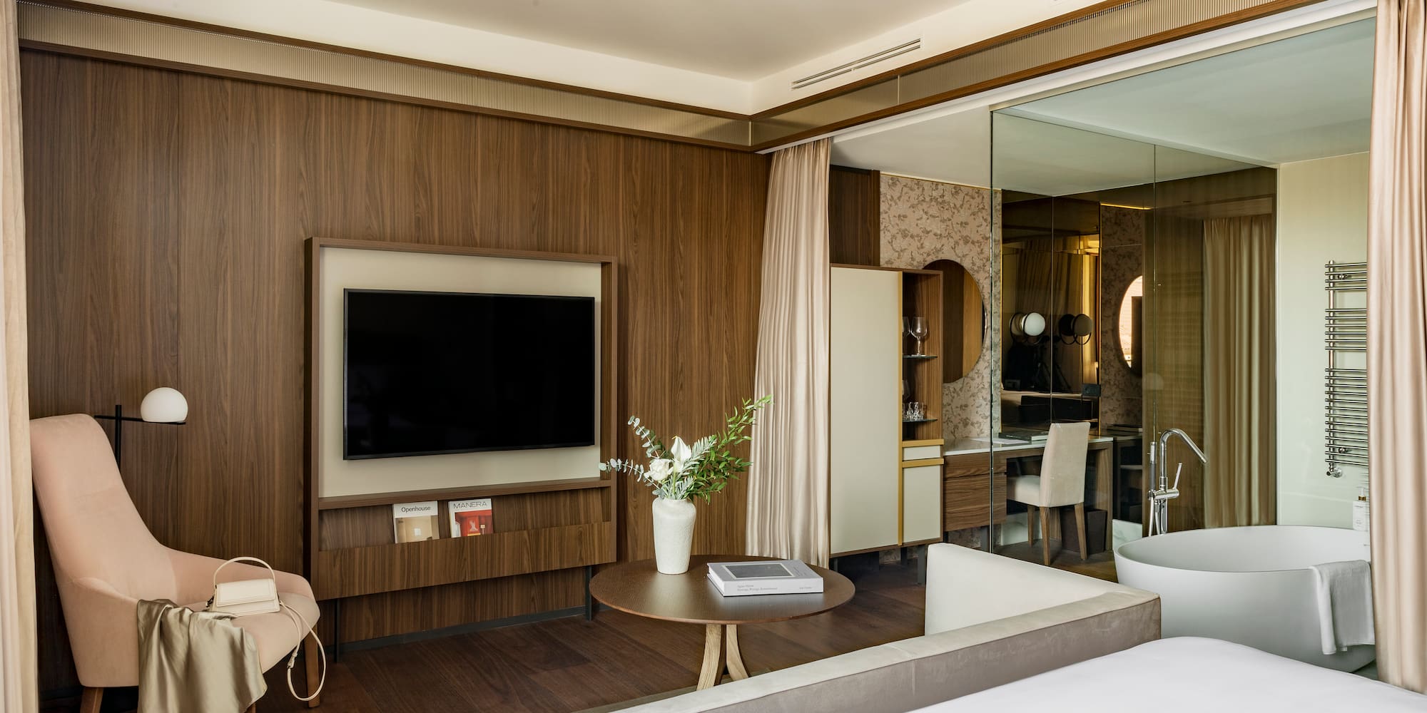 a room with a television and a bed