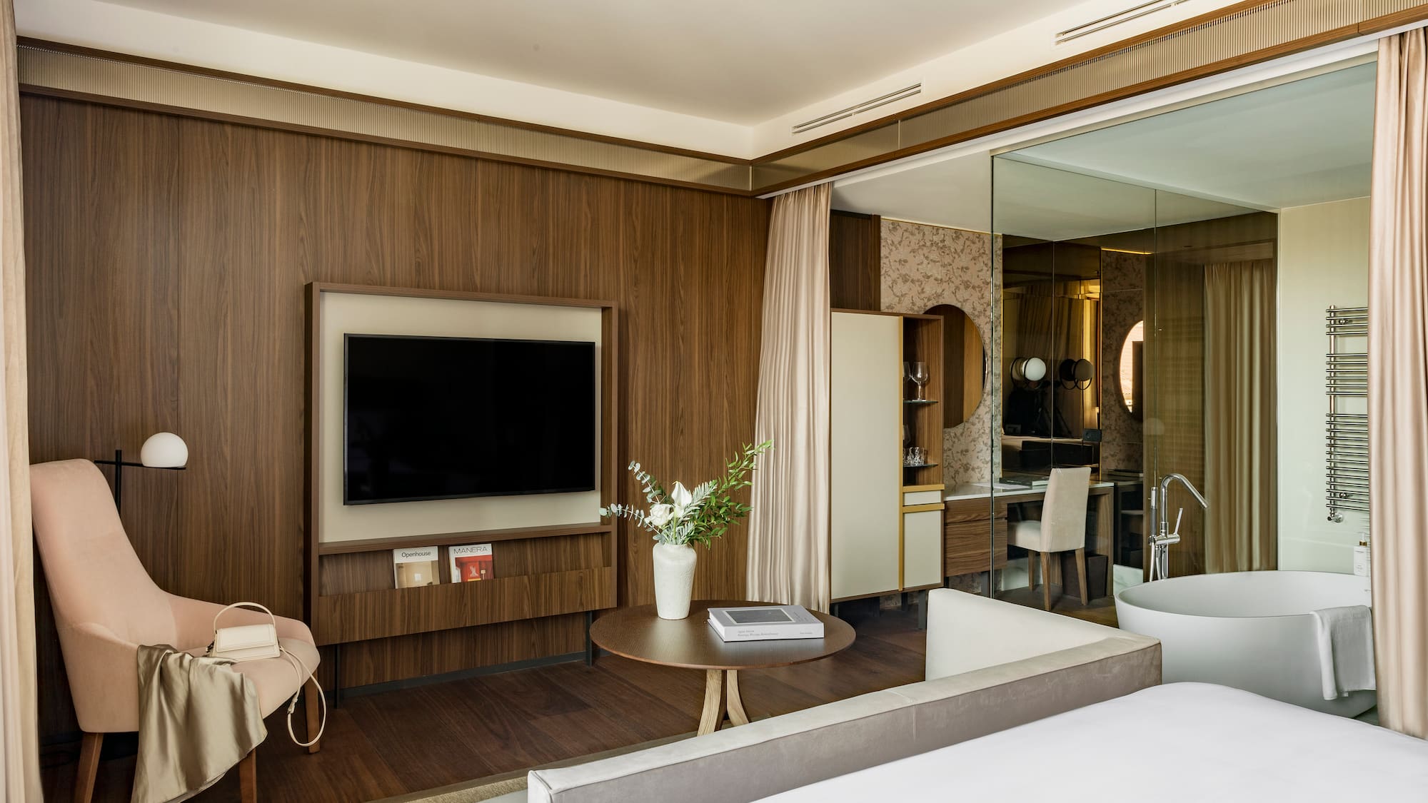 a room with a television and a bed