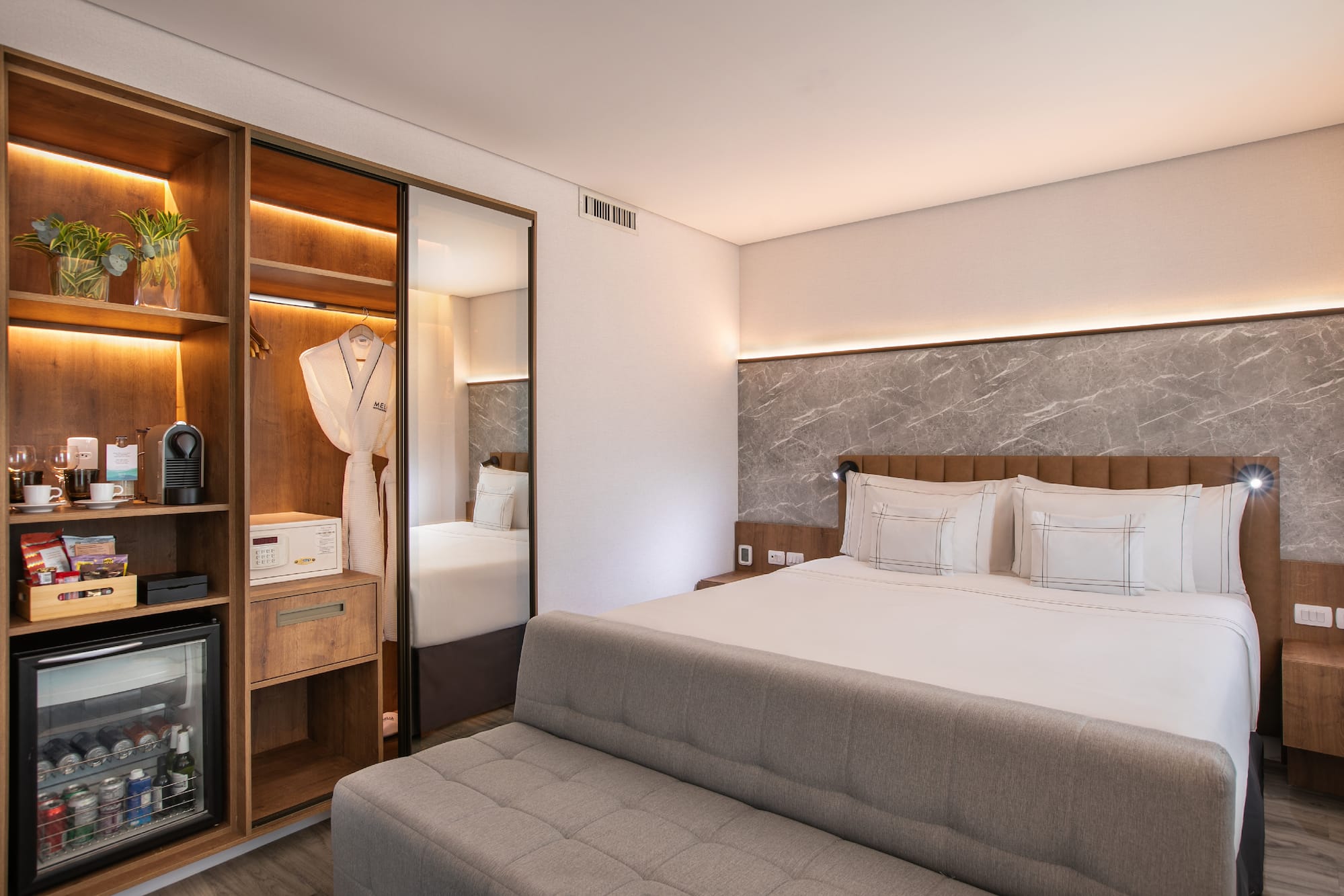 a room with a bed and a closet