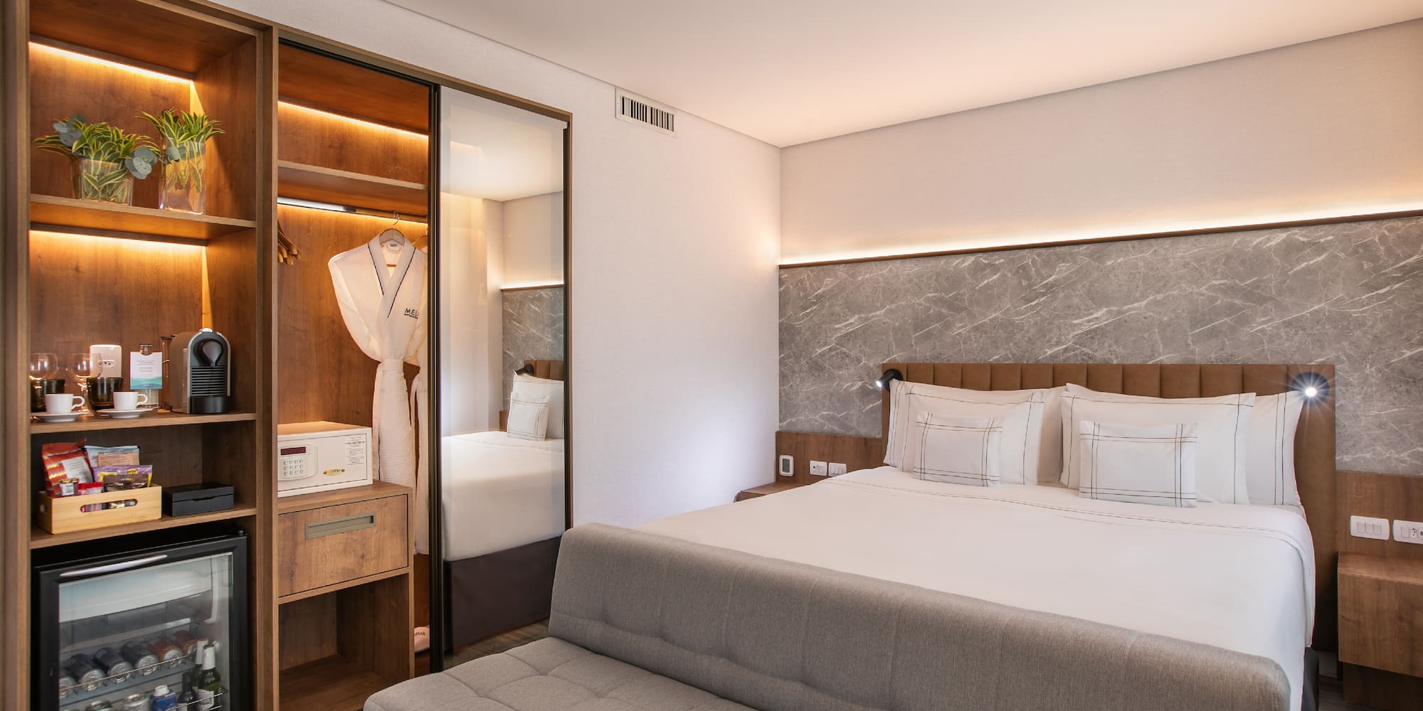 a room with a bed and a closet