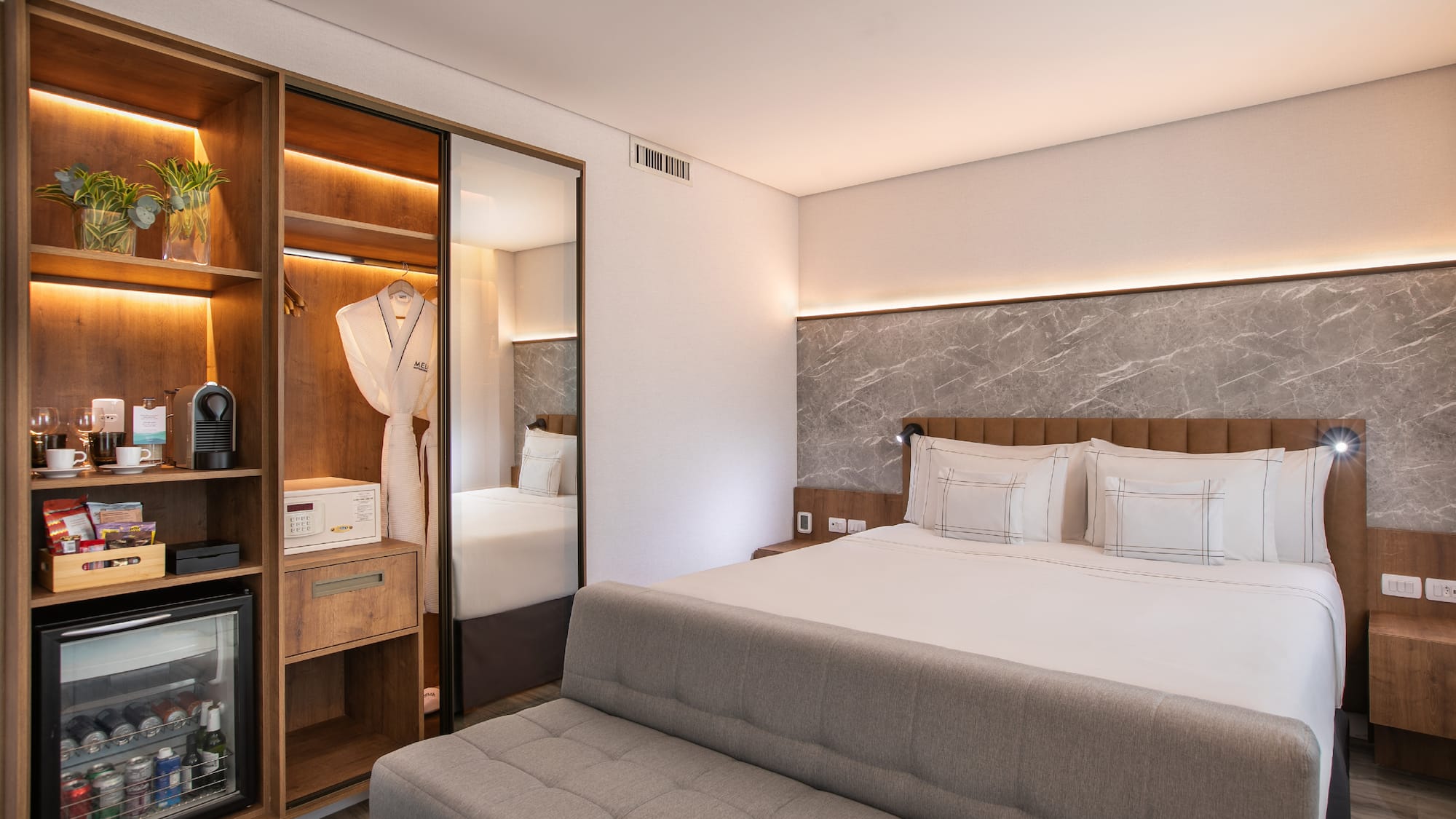 a room with a bed and a closet