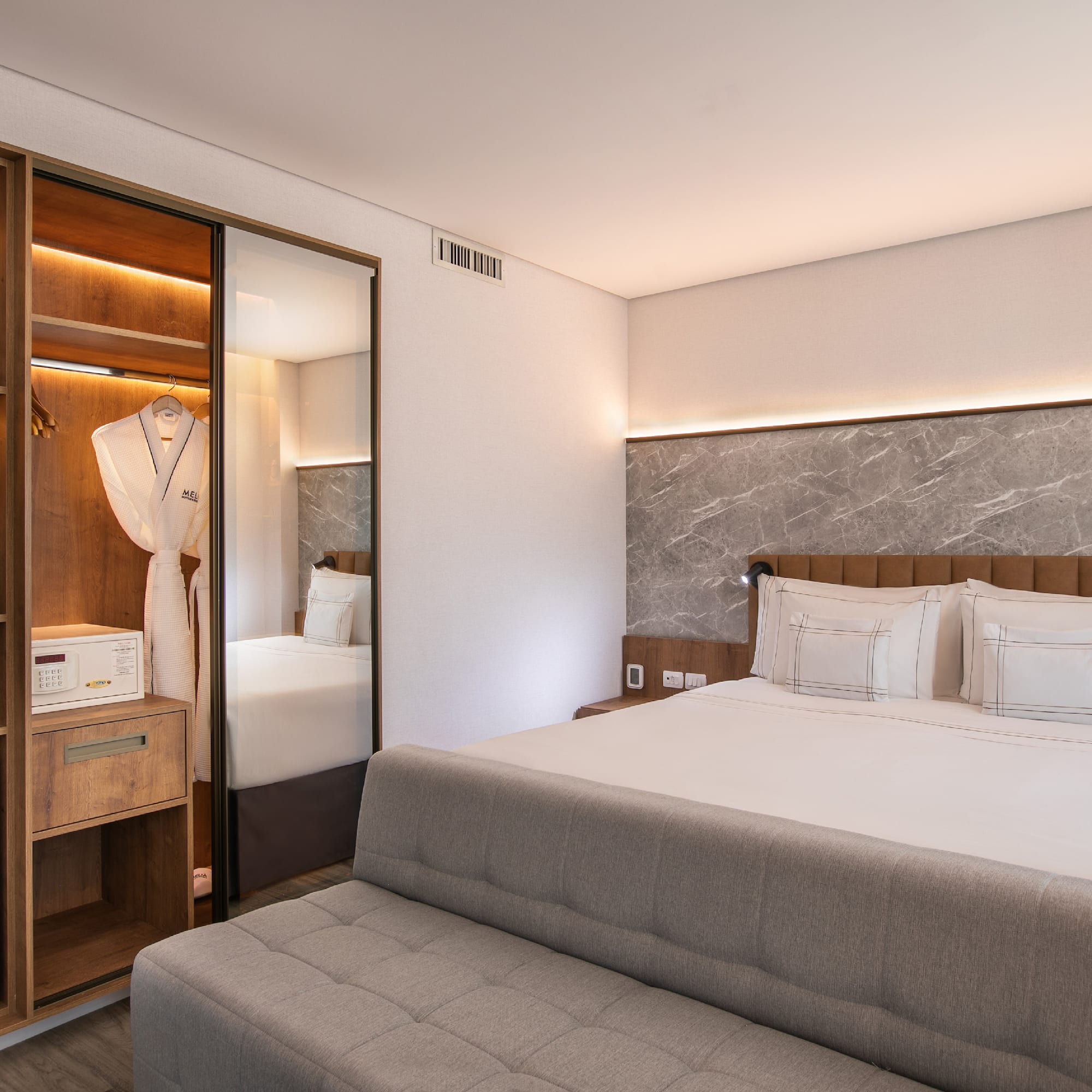 a room with a bed and a closet