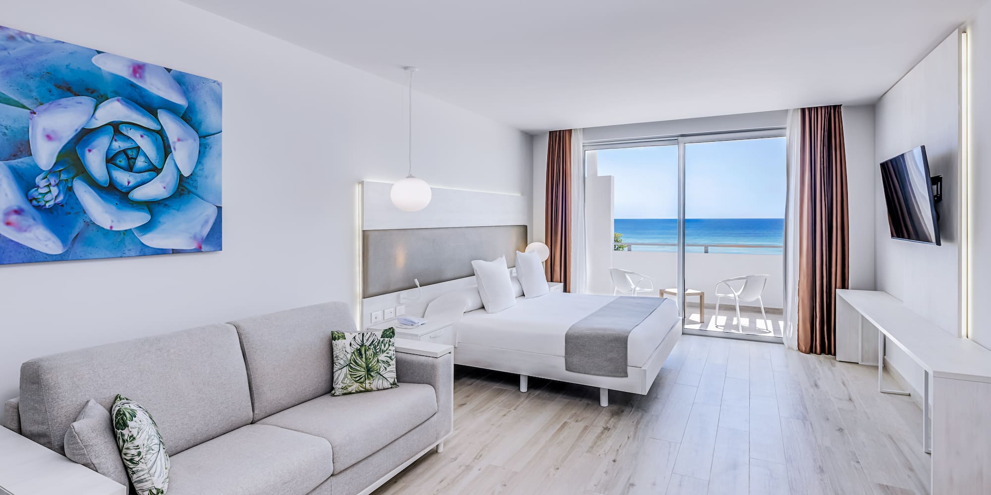 a room with a bed and a couch