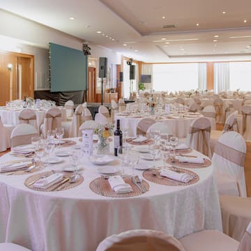 a room with tables and chairs