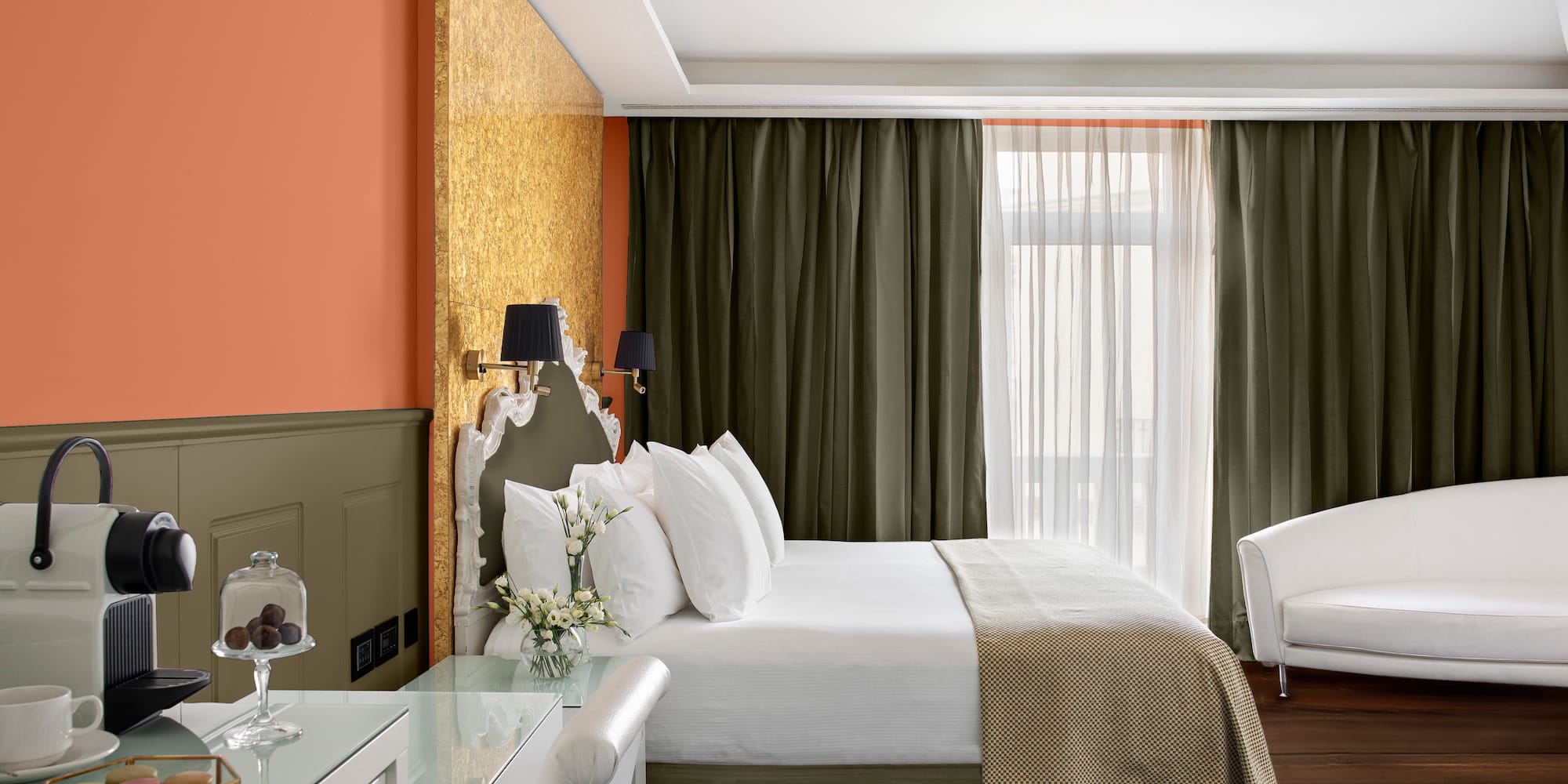 a room with a bed and a desk