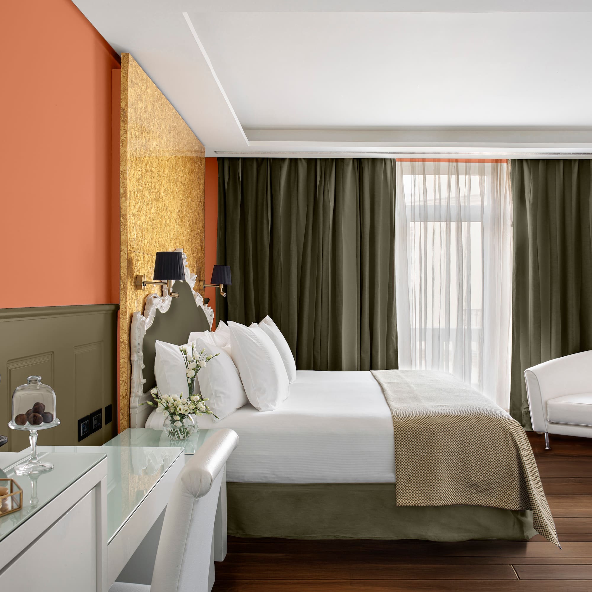 a room with a bed and a desk