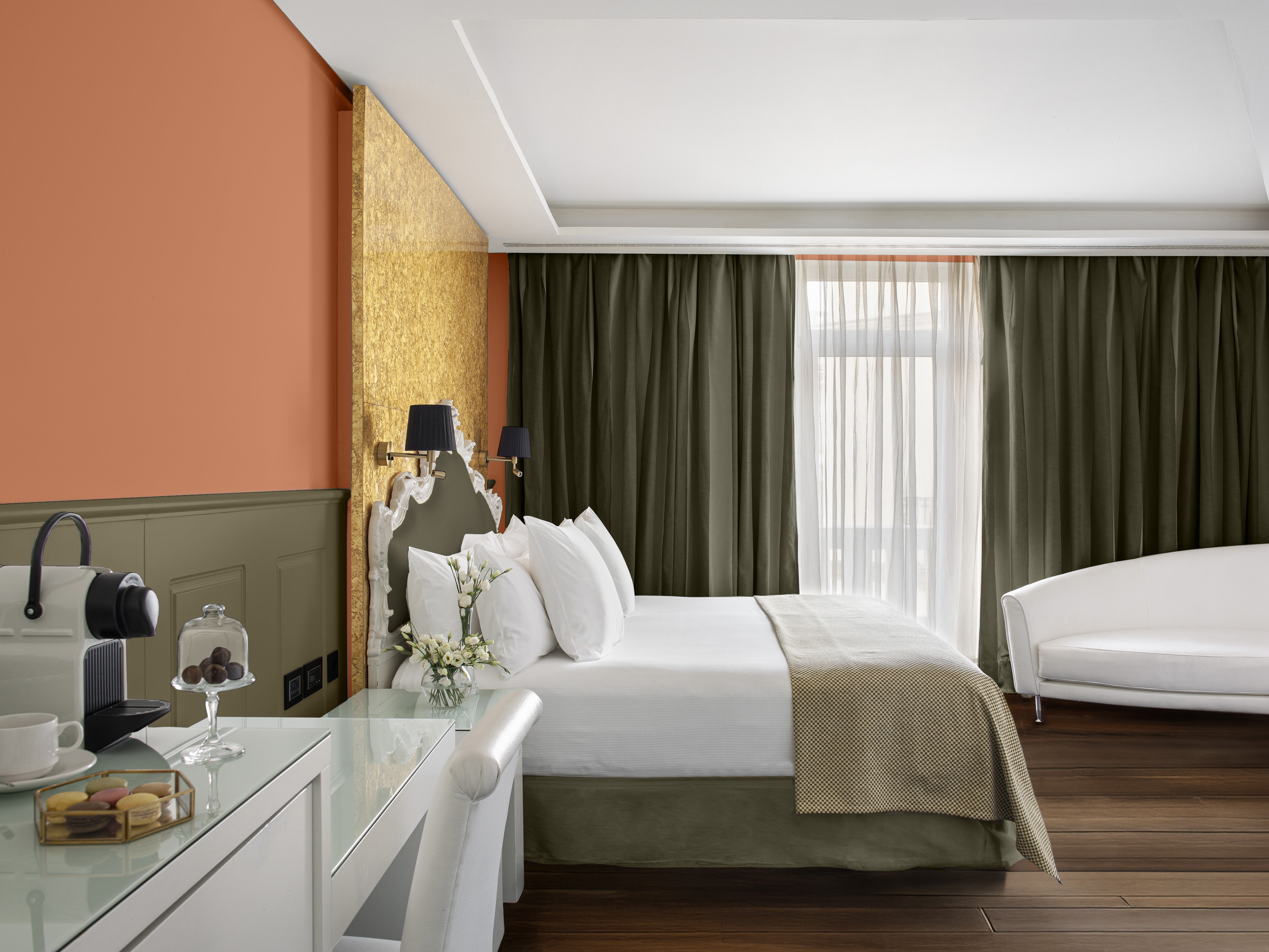 a room with a bed and a desk