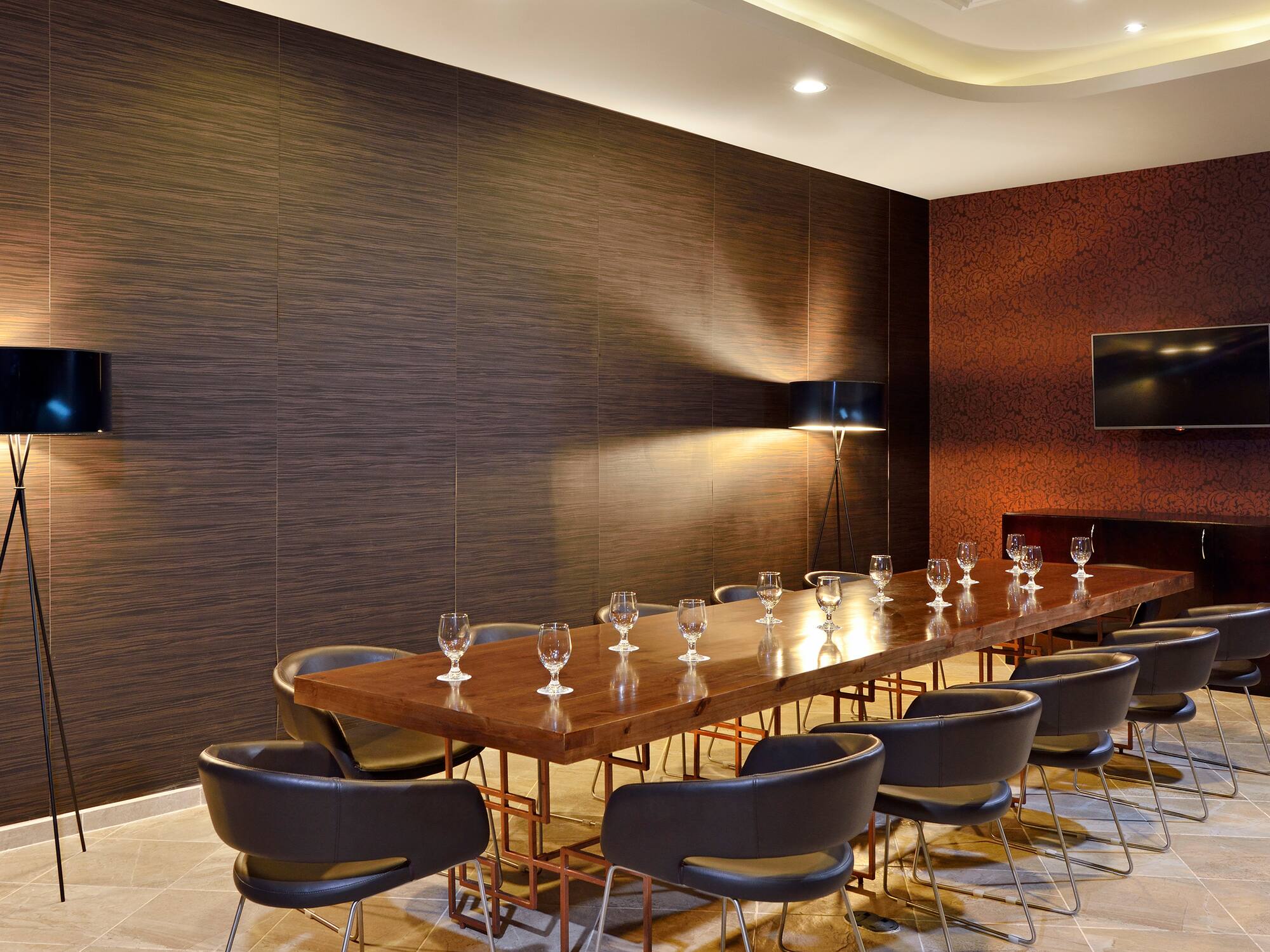 a room with a table and chairs