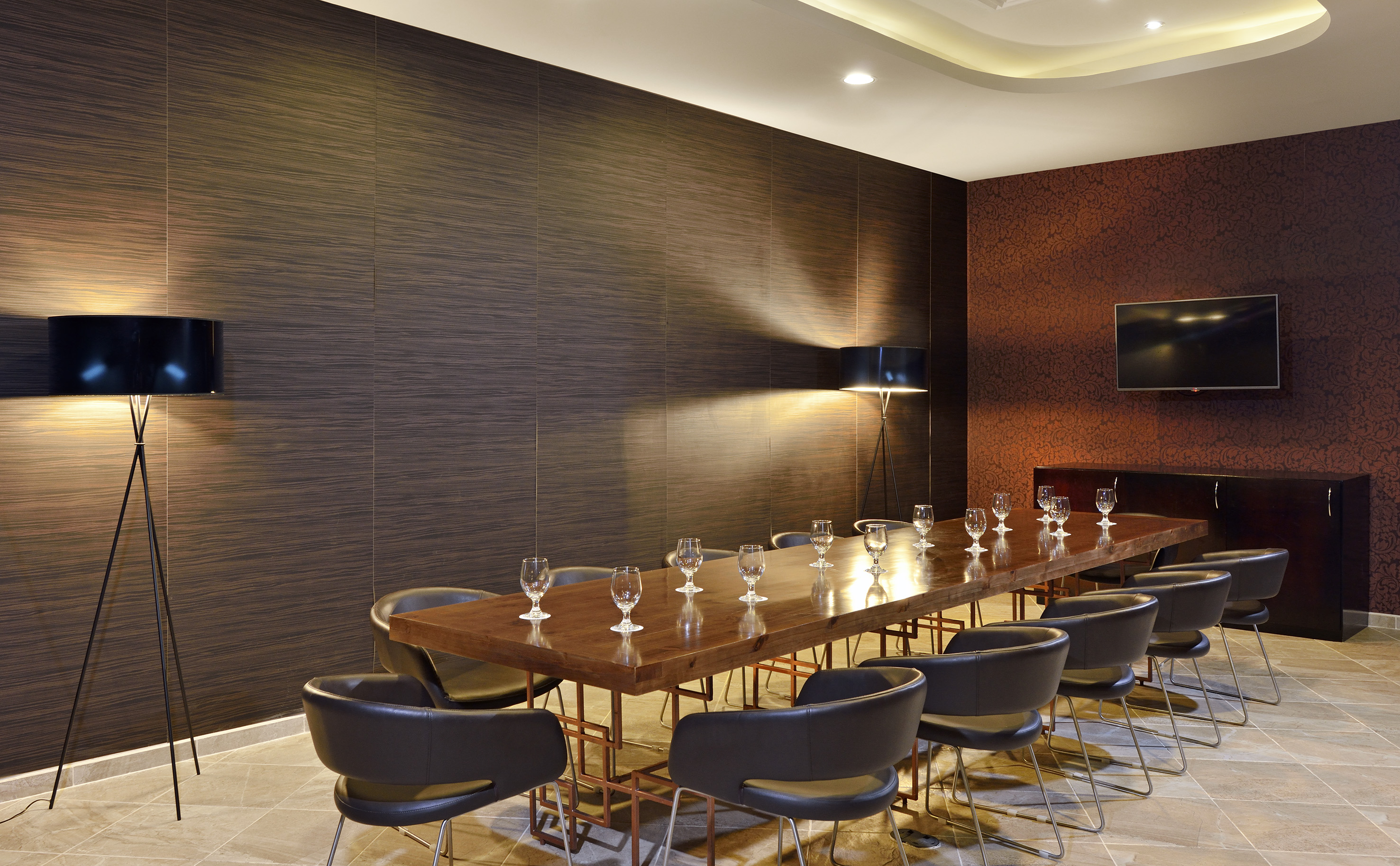 a room with a table and chairs