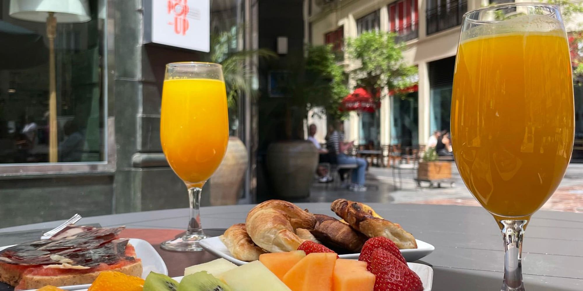 a plate of food and a drink on a table