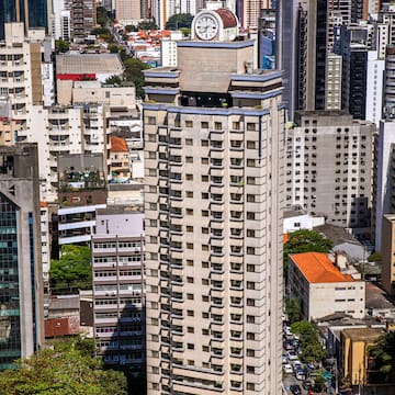 a tall building with a clock on top