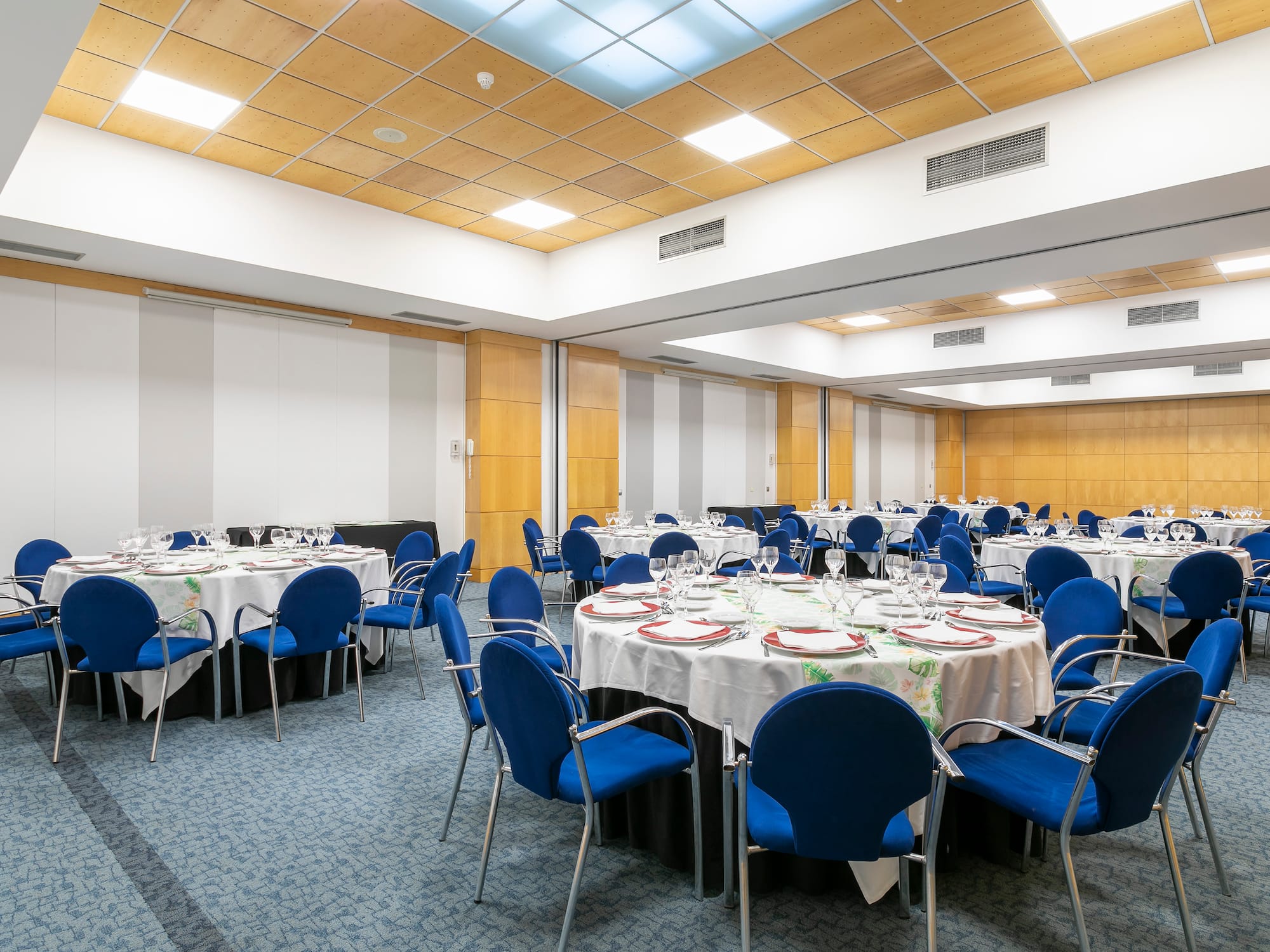 a room with tables and chairs