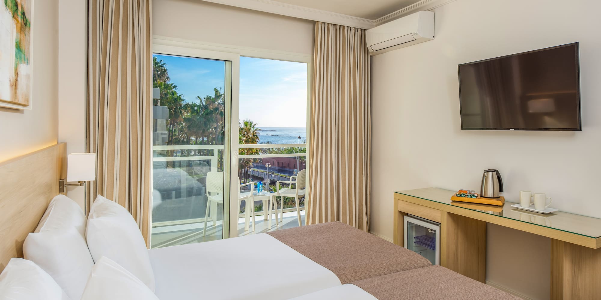 a room with a television and a bed