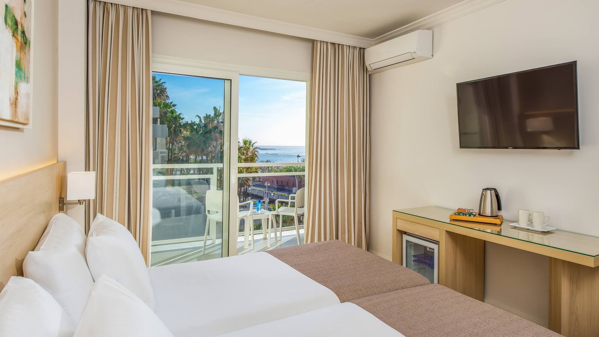 a room with a television and a bed