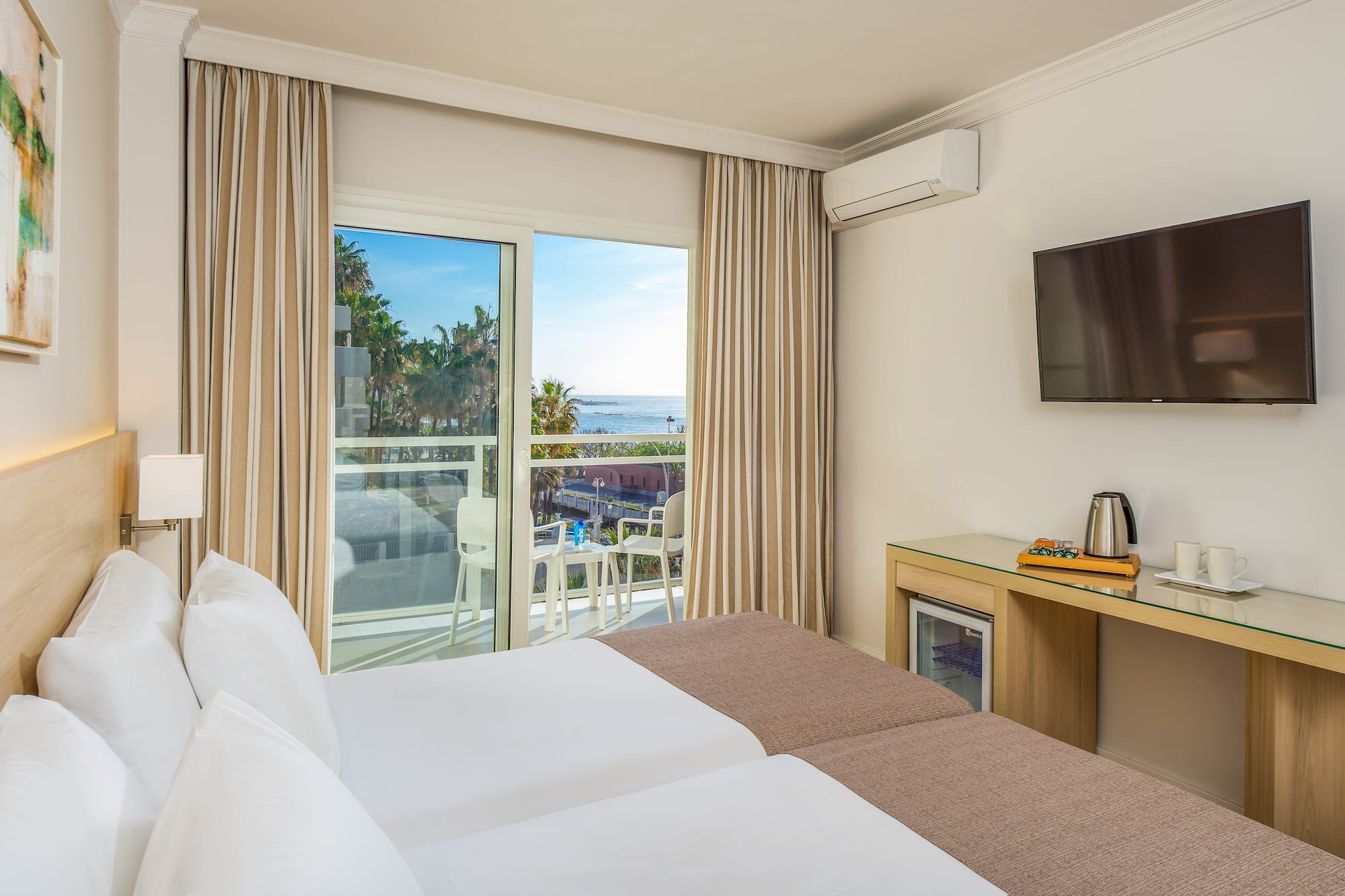 a room with a television and a bed