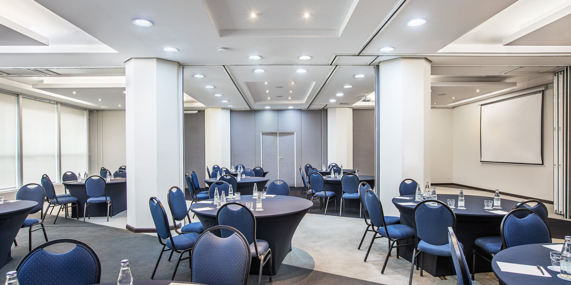 a room with tables and chairs