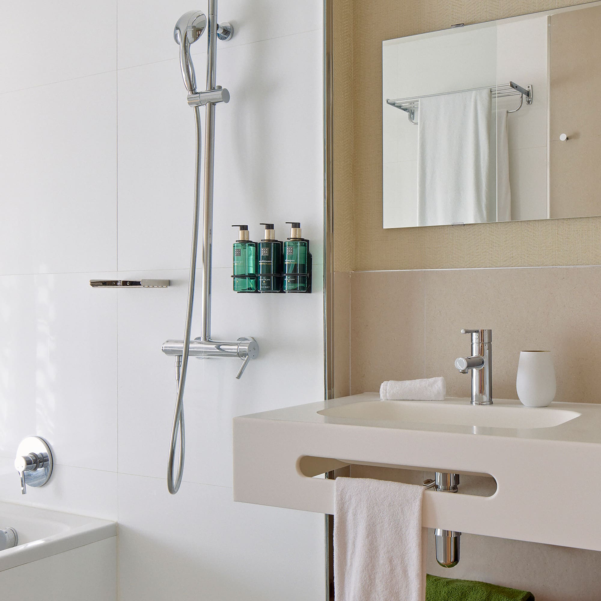 a bathroom with a shower and a sink