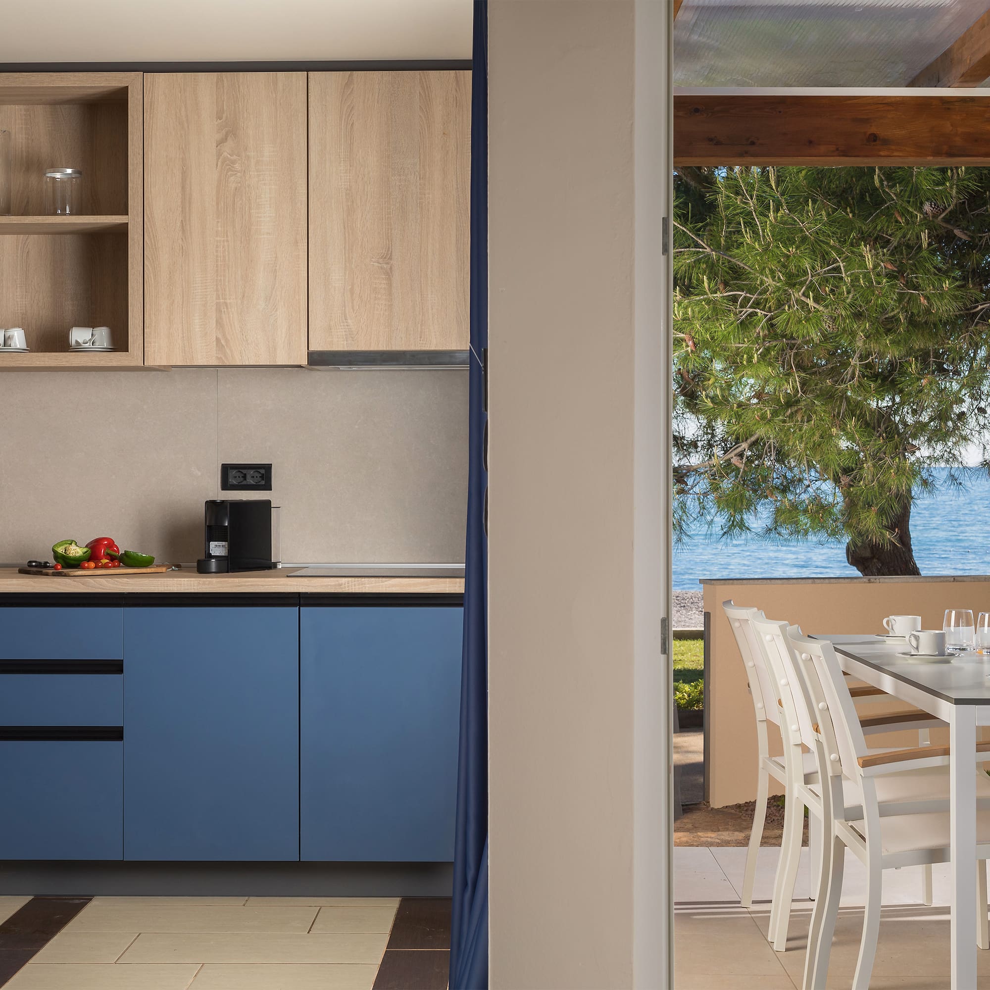 a kitchen with a table and chairs