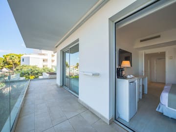 a glass door to a white building