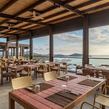a restaurant with tables and chairs