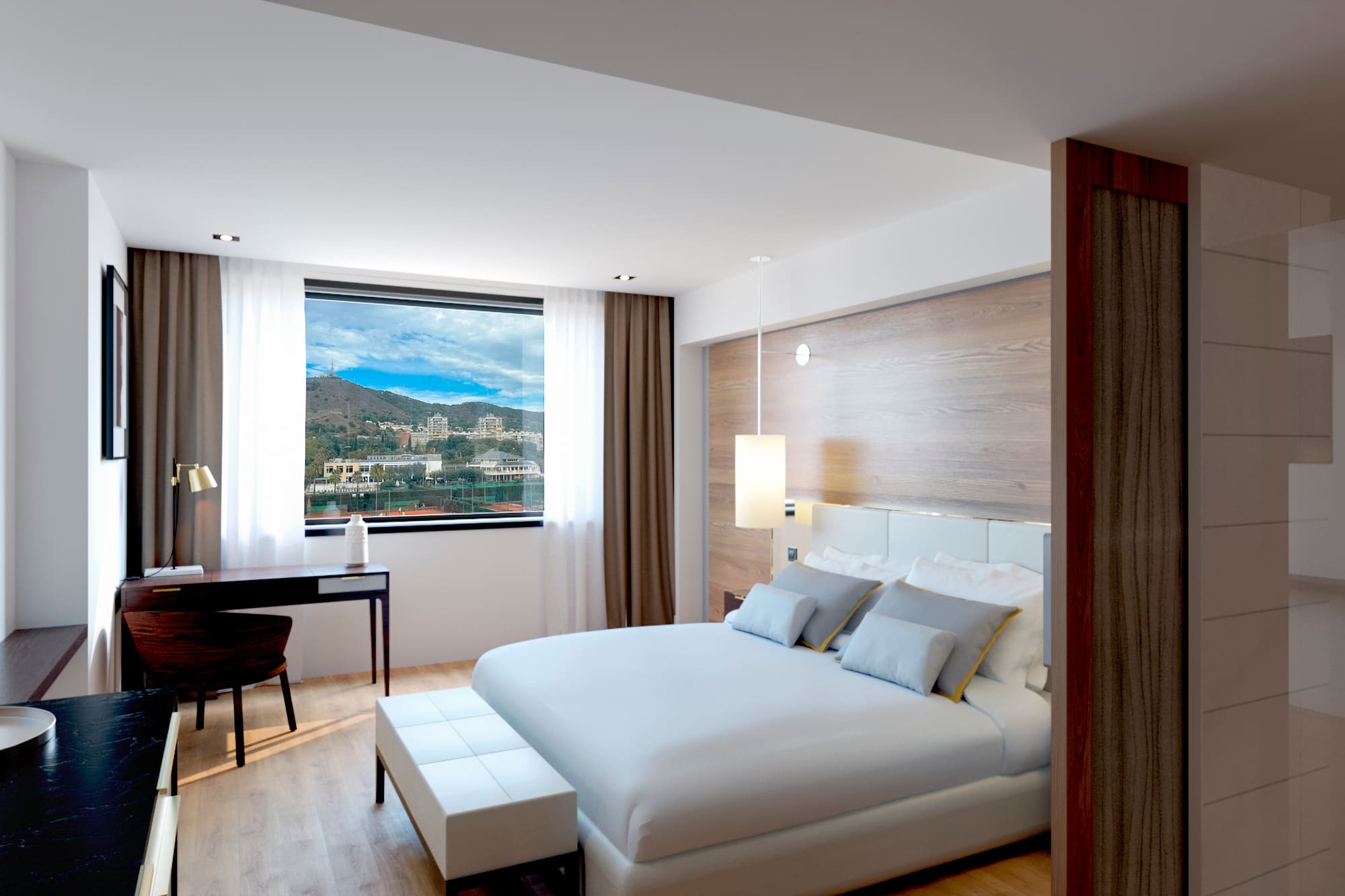 a bedroom with a desk and a bed