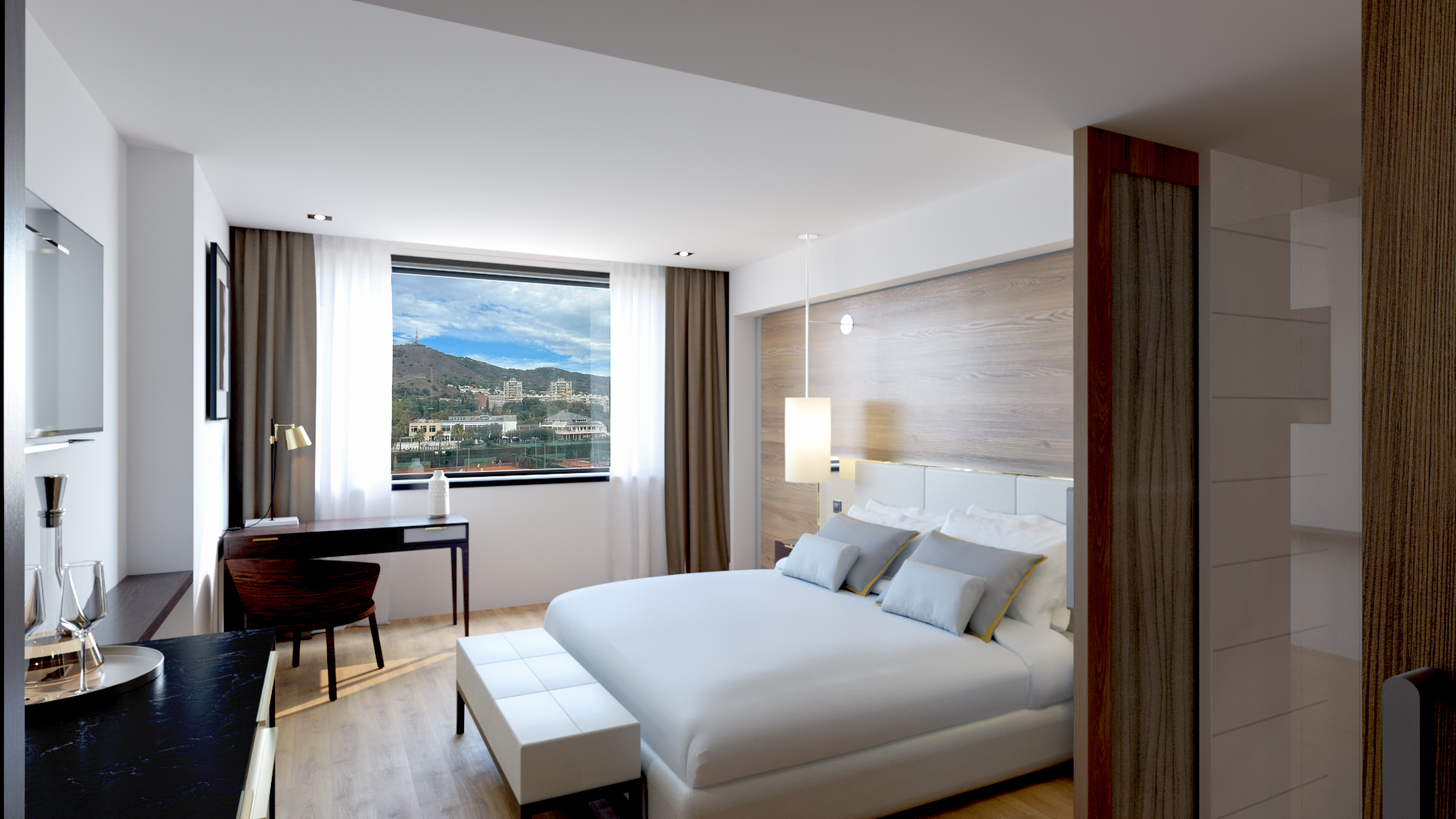 a bedroom with a desk and a bed