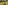 a blurry image of a person walking in a garden
