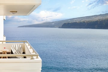 a balcony overlooking a body of water