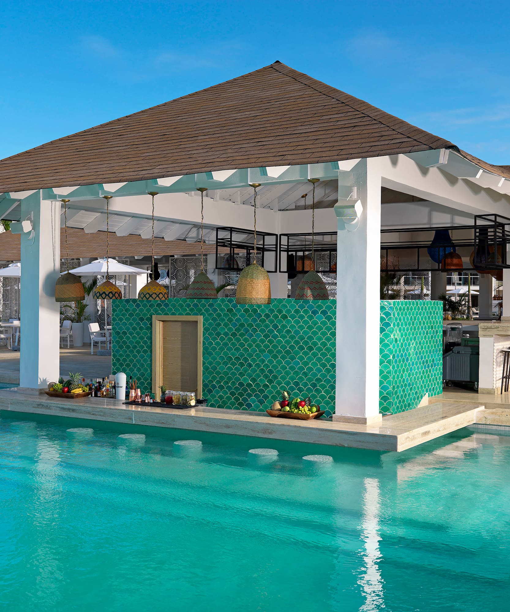 a pool with a bar and a bar