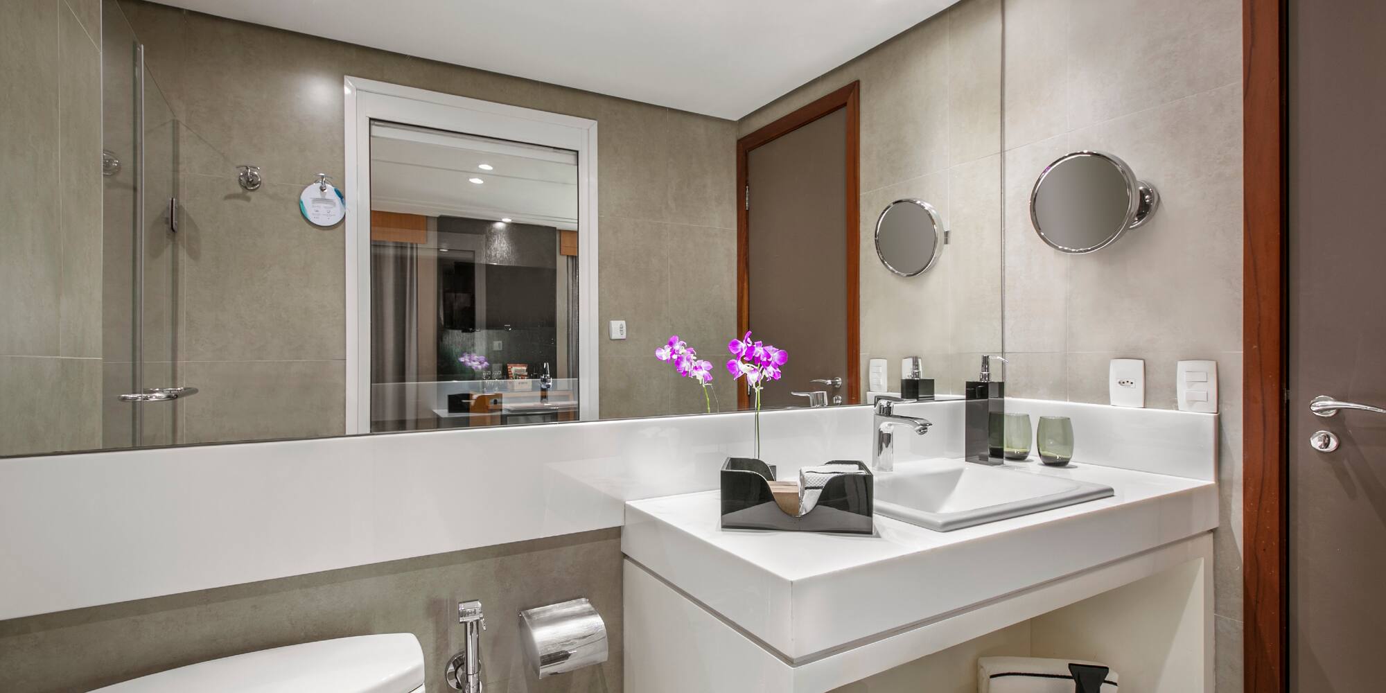 a bathroom with a sink and toilet