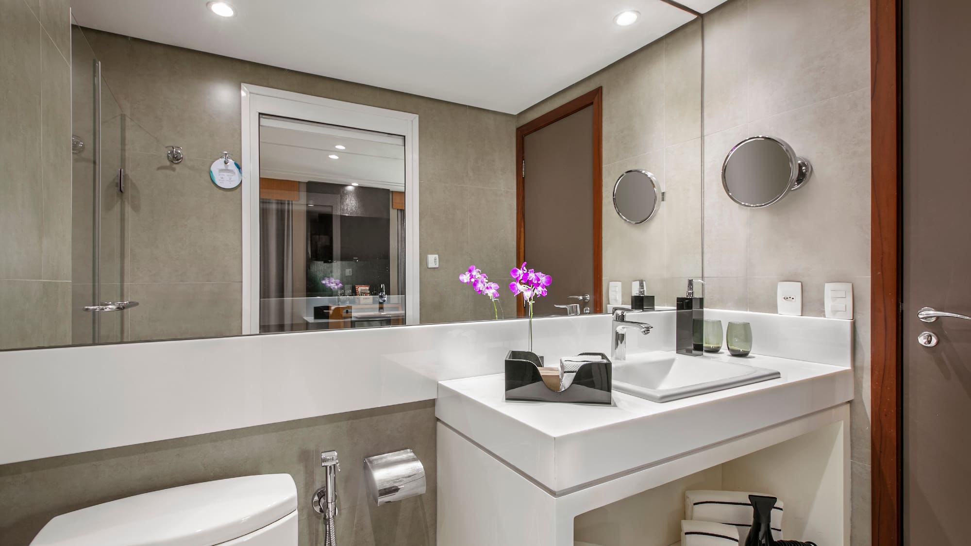 a bathroom with a sink and toilet