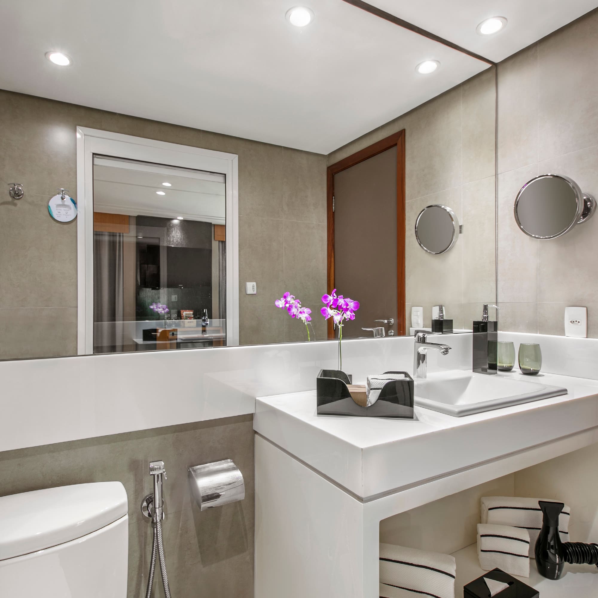 a bathroom with a sink and toilet