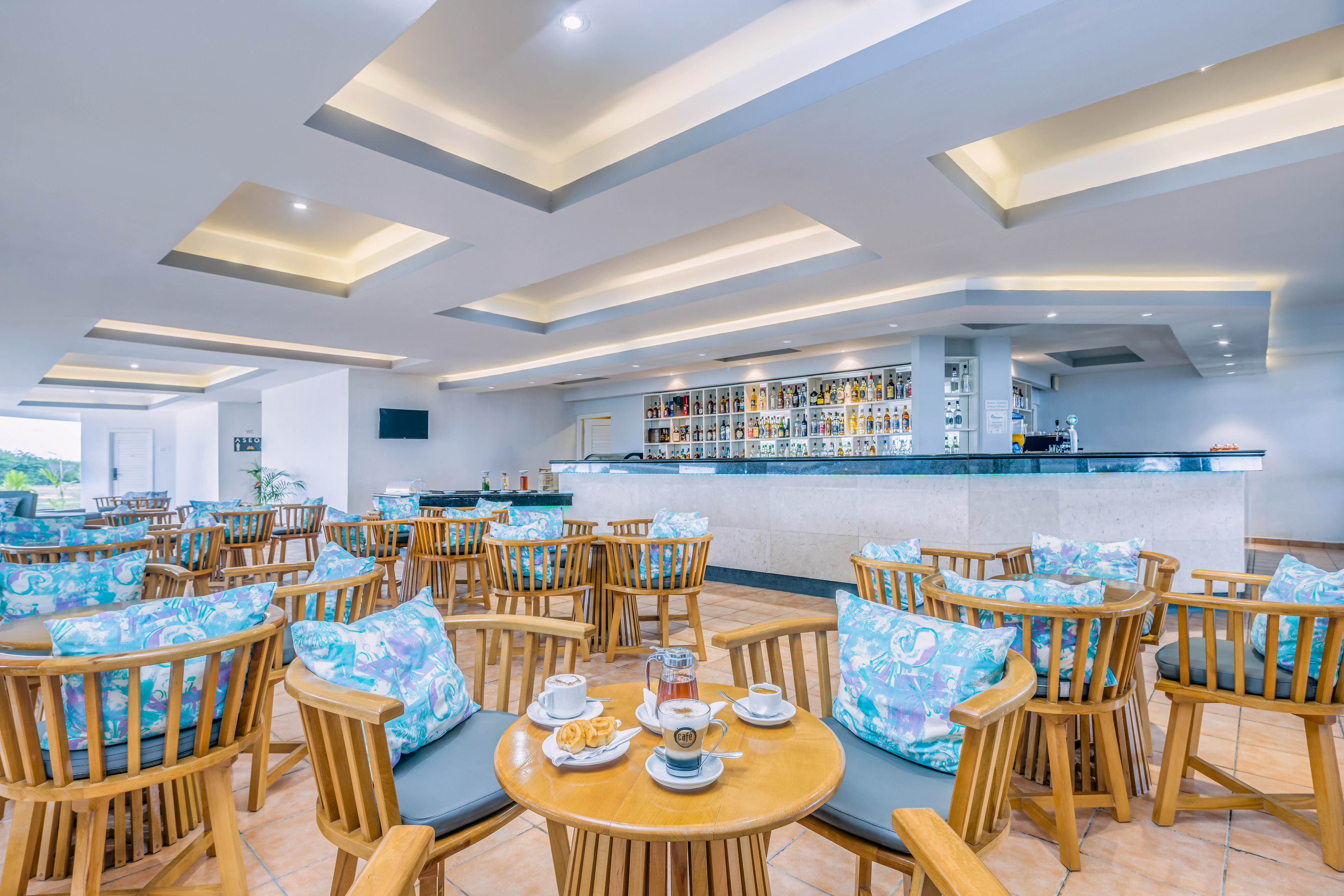 a room with tables and chairs