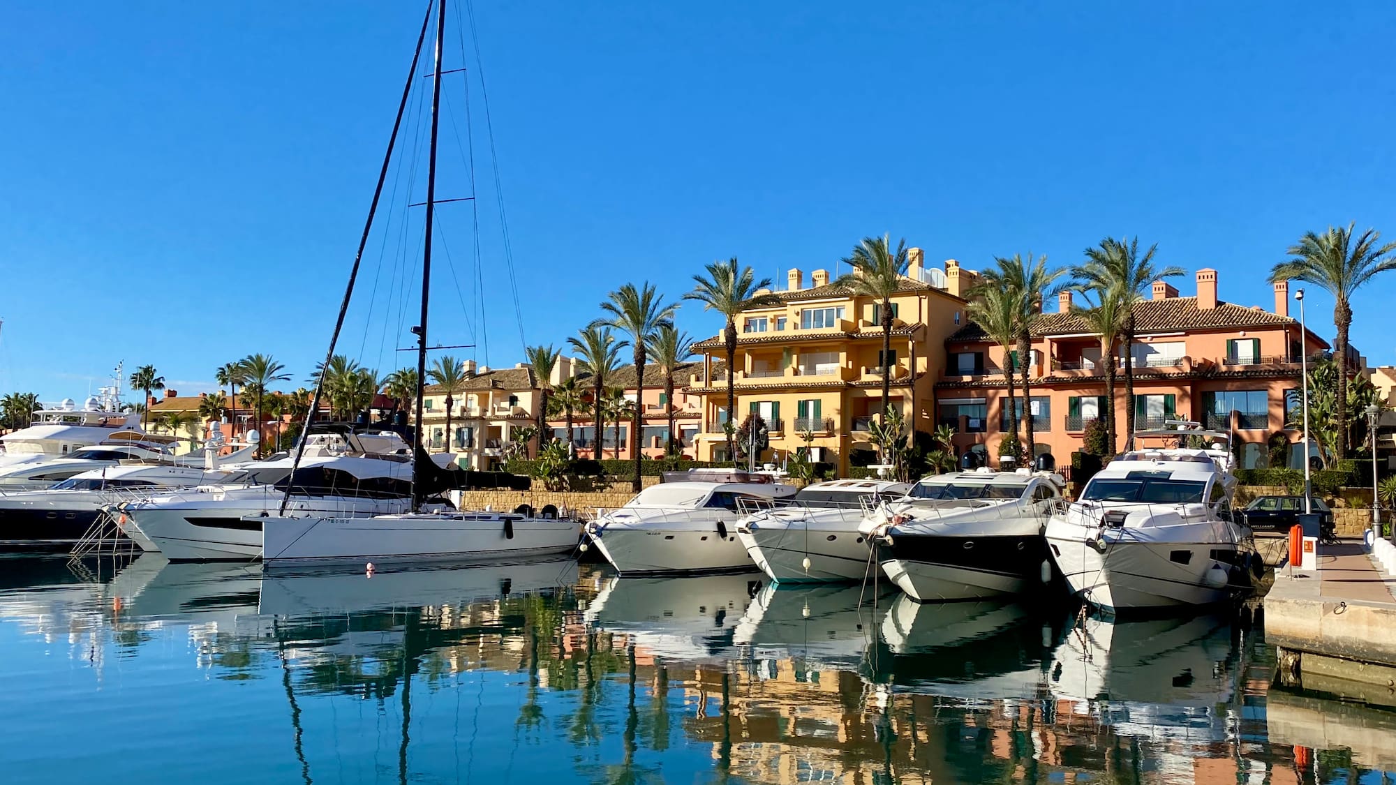 a group of boats in a harbor
