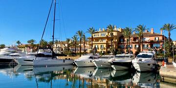 a group of boats in a harbor