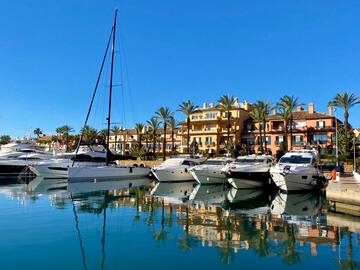 a group of boats in a harbor